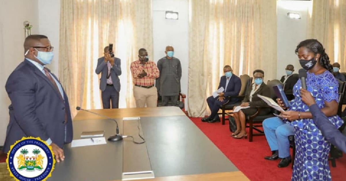 New NEC Commissioner For West Subcribes to Oath of Office Before President Bio