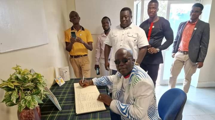 SLSDWA President Signs Book of Condolence in Memory of Late Queen Elizabeth ll