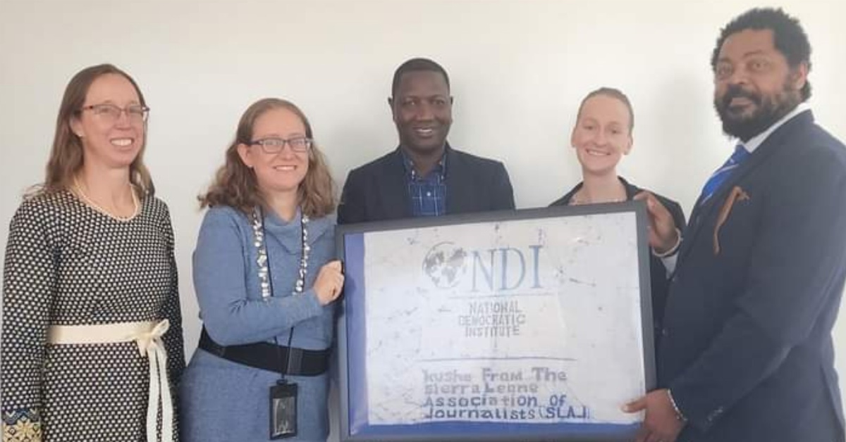 SLAJ President Visits National Democratic Institute Office in Washington