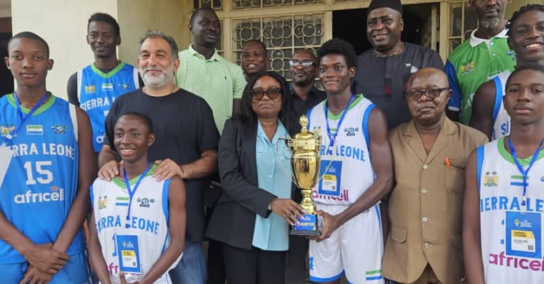 Sierra Leone’s U-16 Basketball Team Presents Historic Trophy to Ministry of Sports