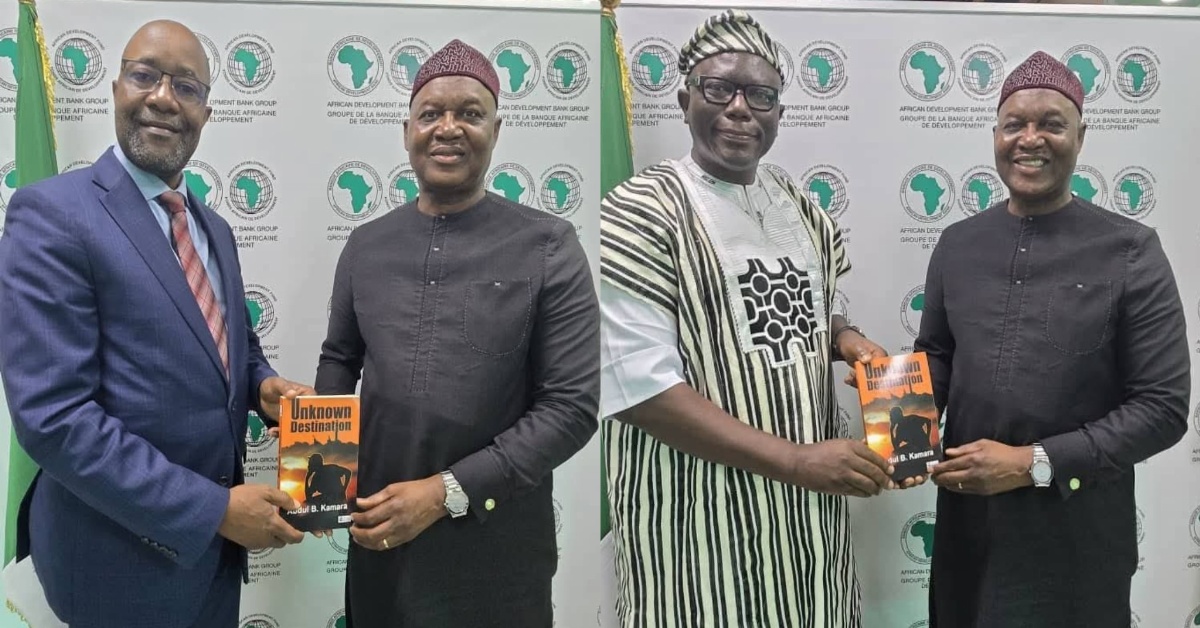 AfDB Director Gifts Book to Sierra Leonean Government Officials